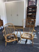 Two Ercol blonde elm armchairs