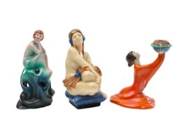 A group of three Art Deco pottery figures