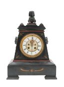 A Victorian Egyptian Revival black slate mantle clock