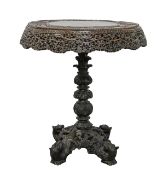 A Burmese hardwood occasional table