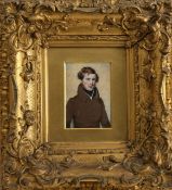 A portrait miniature on ivory of a young gentleman