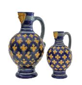 Two Minton majolica bellarmine style jugs