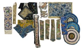A group of Chinese embroidered textiles and rank badges