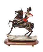 A Michael Sutty porcelain figure