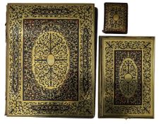 An Edwardian boullework and leather desk folio, album and needle holder