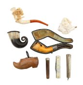 A group of meerschaum pipes, a snuff mull and a snuffbox
