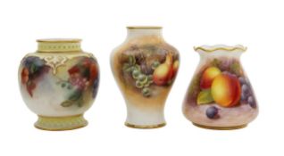 A group of three Royal Worcester porcelain painted fruit vases