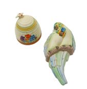 A Clarice Cliff pottery 'Autumn Crocus' honey pot, and 'Love Birds' wall pocket