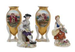 A pair of Sitzendorf porcelain figures, and a pair of Continental vases