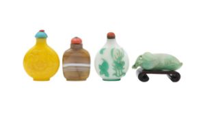 Three Chinese snuff bottles and a jadeite carving of a pea pod