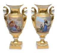 A pair of Continental porcelain urns