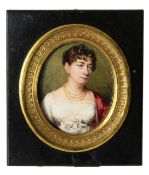 A portrait miniature of a lady wearing a red cloak