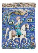 A large Qajar moulded pottery tile
