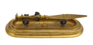 A gilt metal desk stand and letter opener