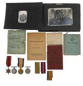 WWII medals, Royal Air Force log books, and a photograph album