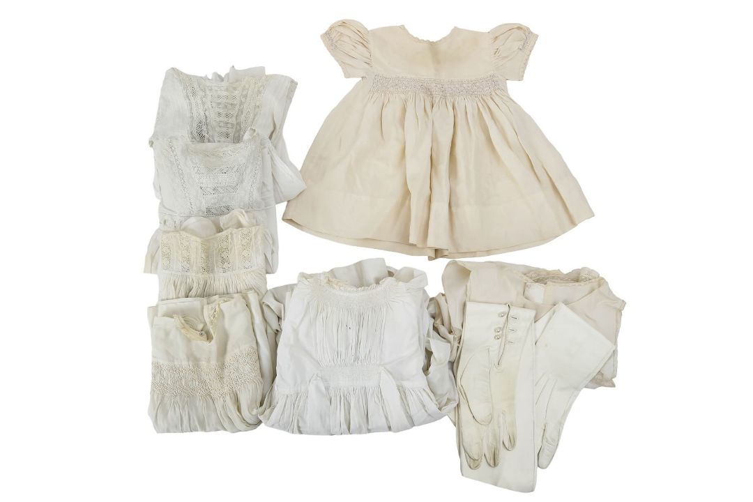 Seven Christening gowns and a pair of leather gloves - Image 1 of 3