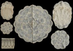 A collection of lace panels and cuffs