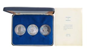 A silver medal set 'Commemorating Man's First Landing on the Moon'