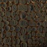 A large collection of Grand Tour plaster intaglio reliefs