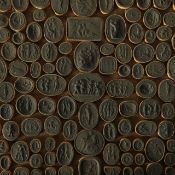 A large collection of Grand Tour plaster intaglio reliefs