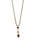A diamond and pink garnet pendant with chain