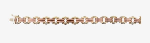 A 9ct fancy link two coloured gold bracelet