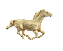 An 18ct gold equestrian brooch