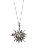 A late Victorian diamond set star brooch with removable necklace fitting