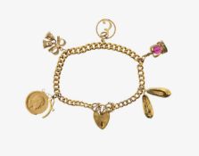A 9ct charm bracelet including half sovereign