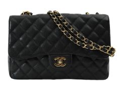 A Chanel 'Jumbo Classic' double flap black caviar bag
