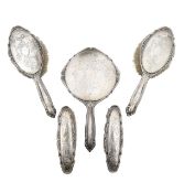 A George V silver mounted dressing table set