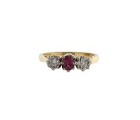 An 18ct gold, ruby and diamond trilogy ring
