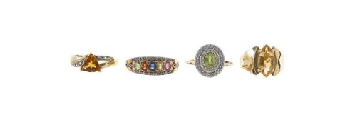 A fancy sapphire and diamond ring, two gold citrine rings and and a sphene ring