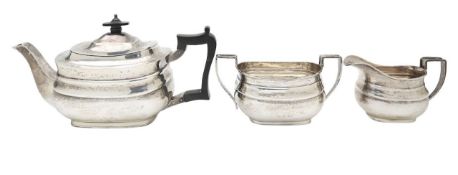A George V silver three piece tea service