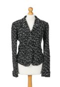 A Chanel black tweed blazer