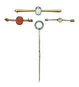 An Art Deco diamond and emerald stick pin, aquamarine, peridot and cameo brooches
