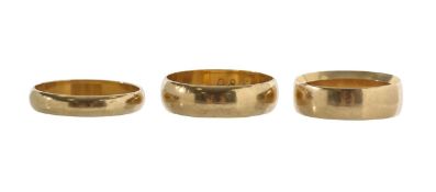Three gold wedding bands