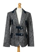 A Chanel velcro black and white blazer,