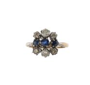 A diamond and sapphire ring
