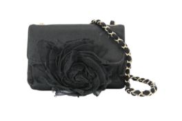 A Chanel 'Camellia' evening black mini flap bag