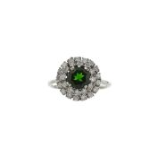 A diamond and garnet dress ring