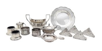 A collection of silver cruets, dish and napkin rings