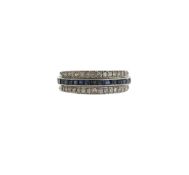 A diamond, sapphire and ruby eternity ring