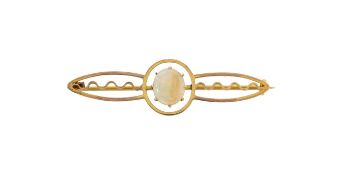 An opal and gold brooch