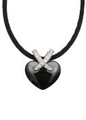 A Chaumet ceramic heart diamond pendant