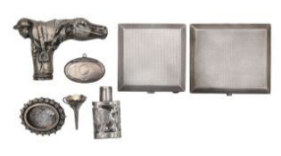 A collection of silver novelty items
