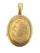 A Victorian oval portrait locket
