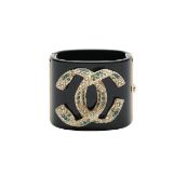 A Chanel CC wide cuff bracelet
