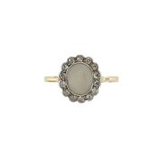 An opal and diamond 'daisy' cluster ring