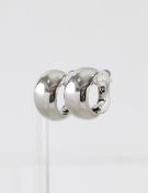A pair of bombe half hoop earrings